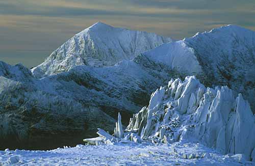 Snowdon and Castell y Gwynt in snow from photolibrary wales